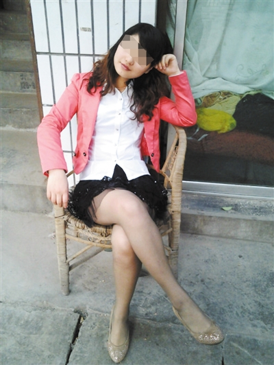 　2012年6月張貴英上傳到QQ空間的一張照片，拍攝于宜賓市金發(fā)街。今年上半年，張貴英在宜賓打工。